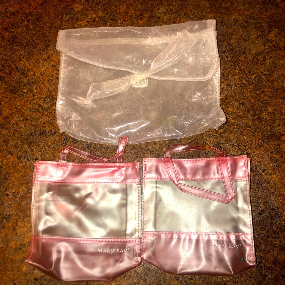 VINTAGE MARY KAY BAGS: 1 opaque w/satin ribbon; 2 small pink & opaque bags.